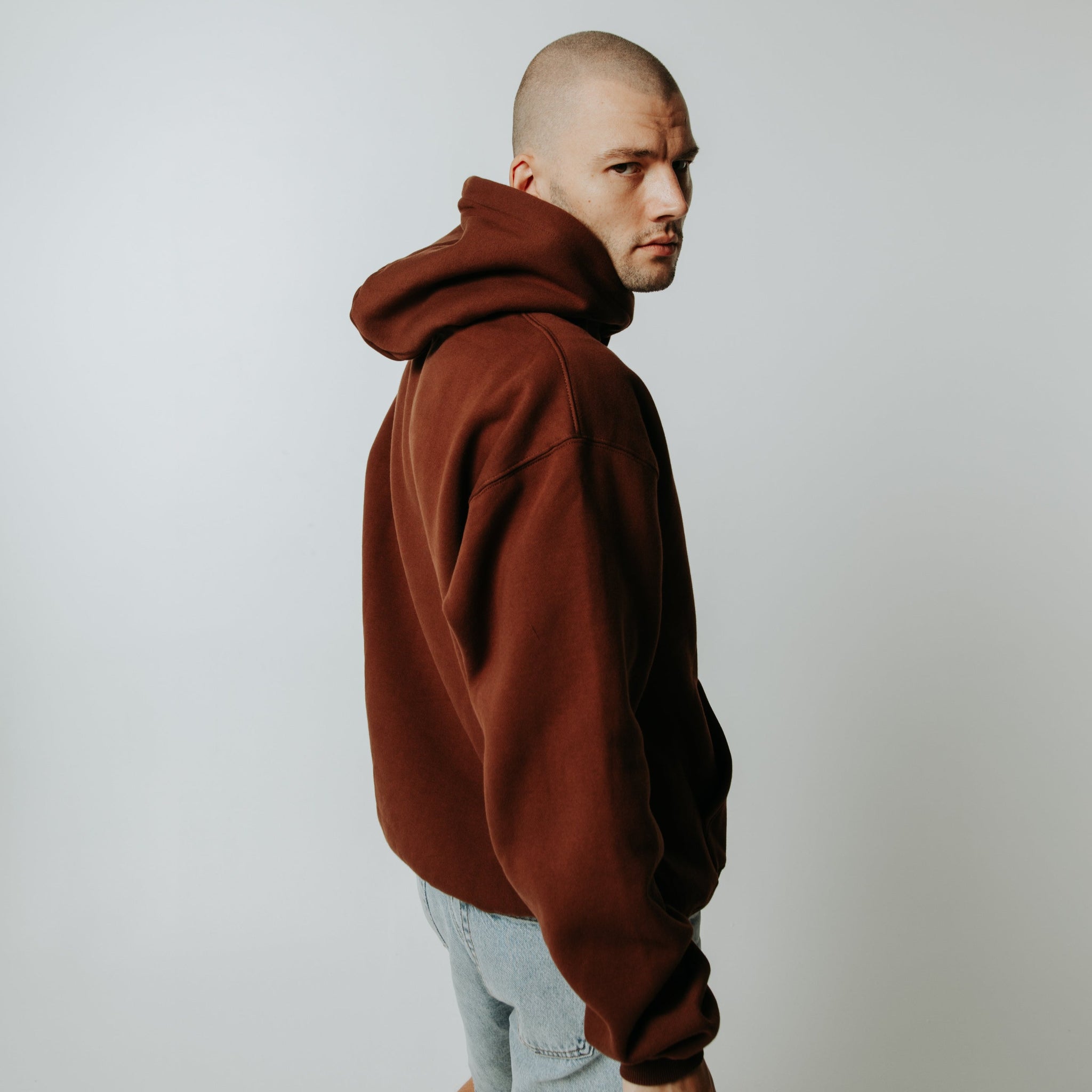 Streetwear oversized brown hoodie with buff print  السعوديةهودي اوفرسايز بني ماركة ثلاثة وعشرين ٢٣ studio 23