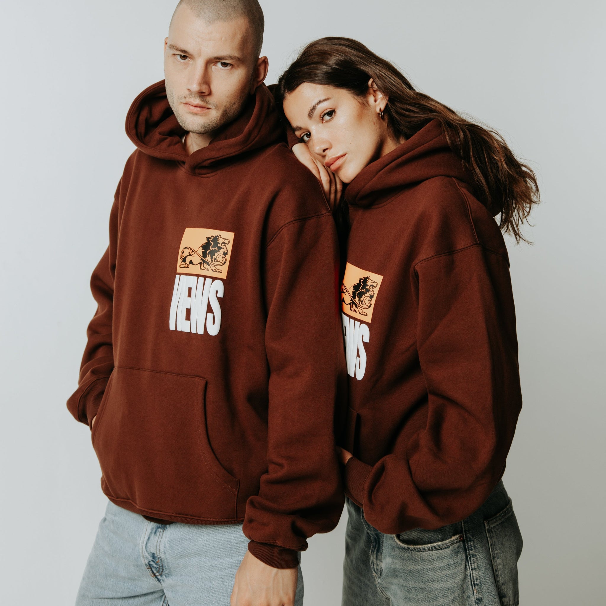 Streetwear oversized brown hoodie with buff print  السعوديةهودي اوفرسايز بني ماركة ثلاثة وعشرين ٢٣ studio 23